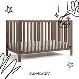 morningside hazelnut crib with black doodles overlaid on image
