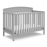 graco benton pebble gray crib angle view