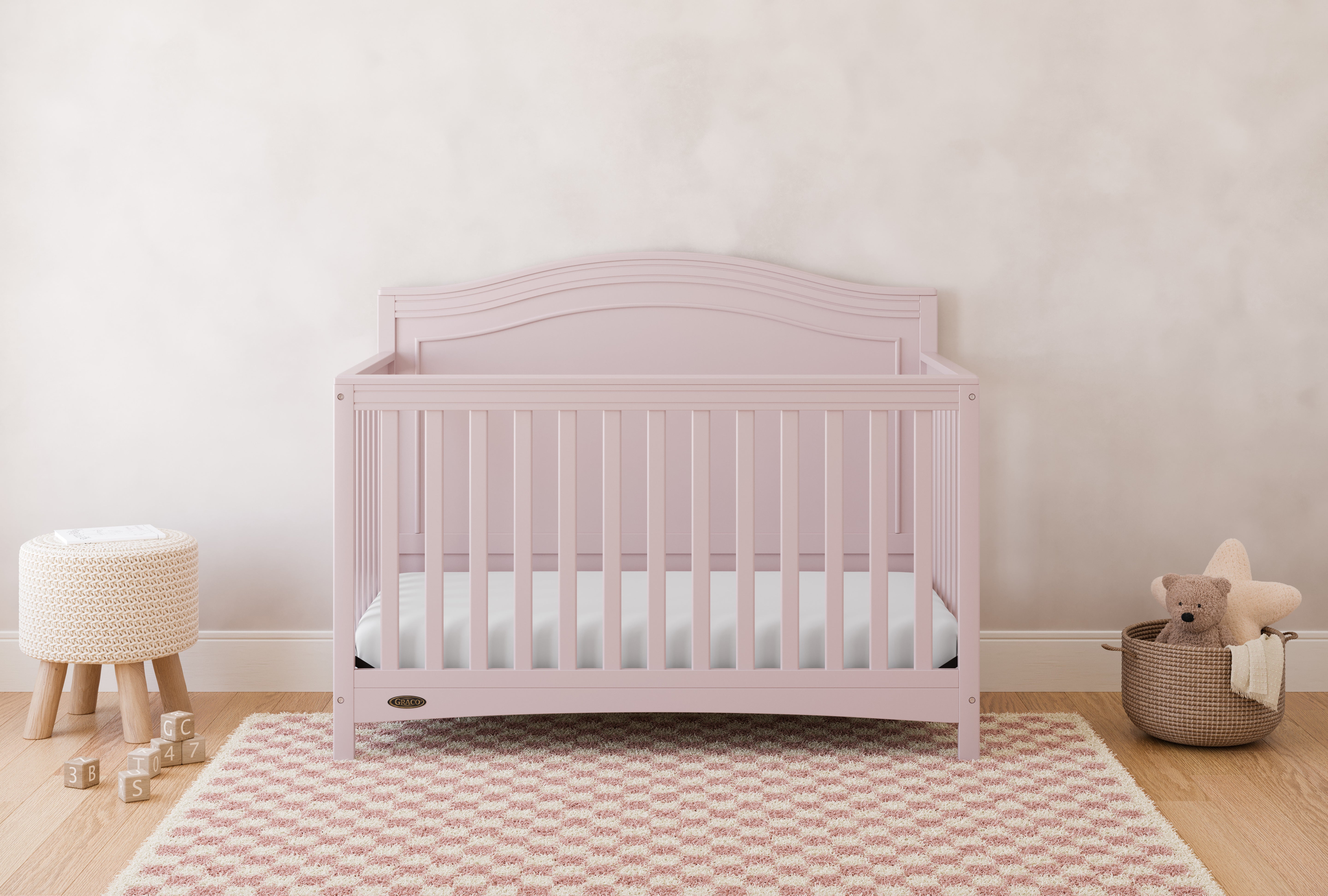 graco paris blush crib in nursery
