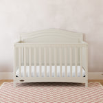 graco paris frosted oat crib in nursery