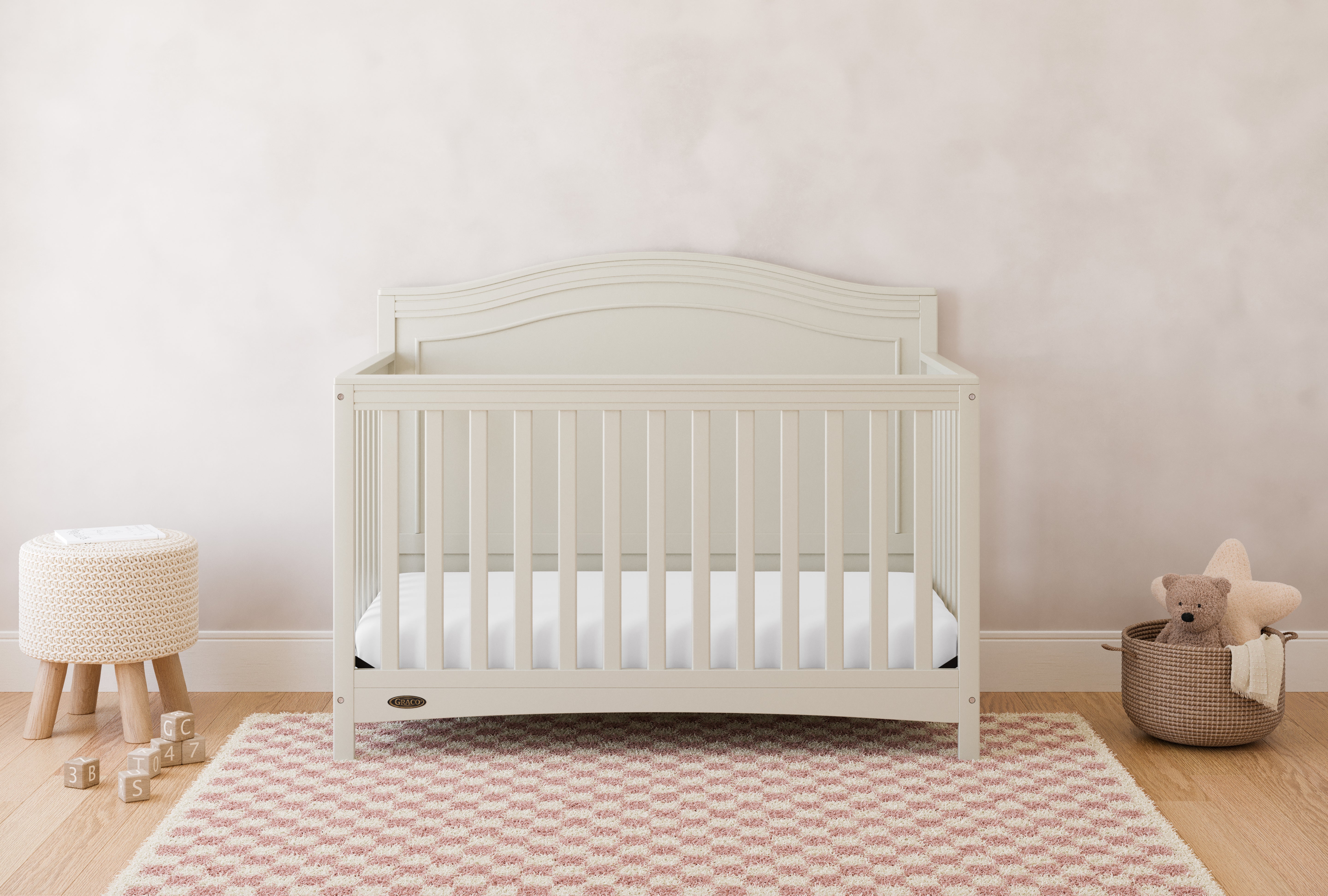 graco paris frosted oat crib in nursery