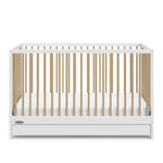 Front view of white with driftwood crib