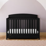 graco benton black crib with drawer in nursery