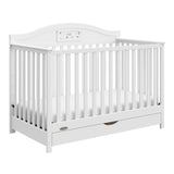 graco story white crib with drawer angle view