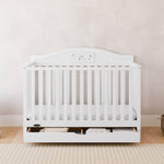 graco story white crib with drawer in nursery