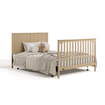 Hadley driftwood crib and changer converted to full-size bed with footboard