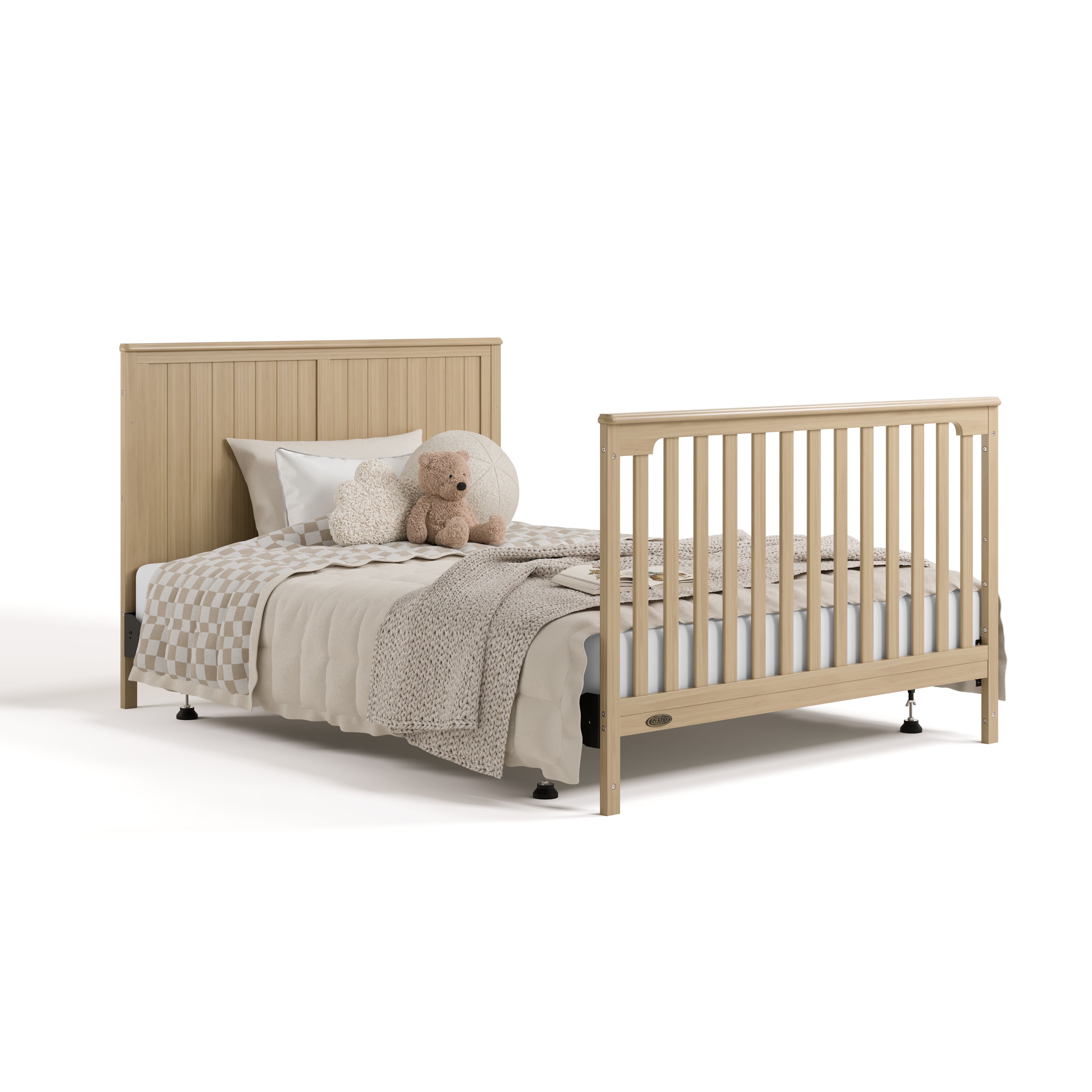Hadley driftwood crib and changer converted to full-size bed with footboard