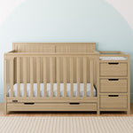 Hadley driftwood crib and changer in a nursery