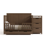 Hadley hazelnut crib and changer converted to toddler bed with two guardrails