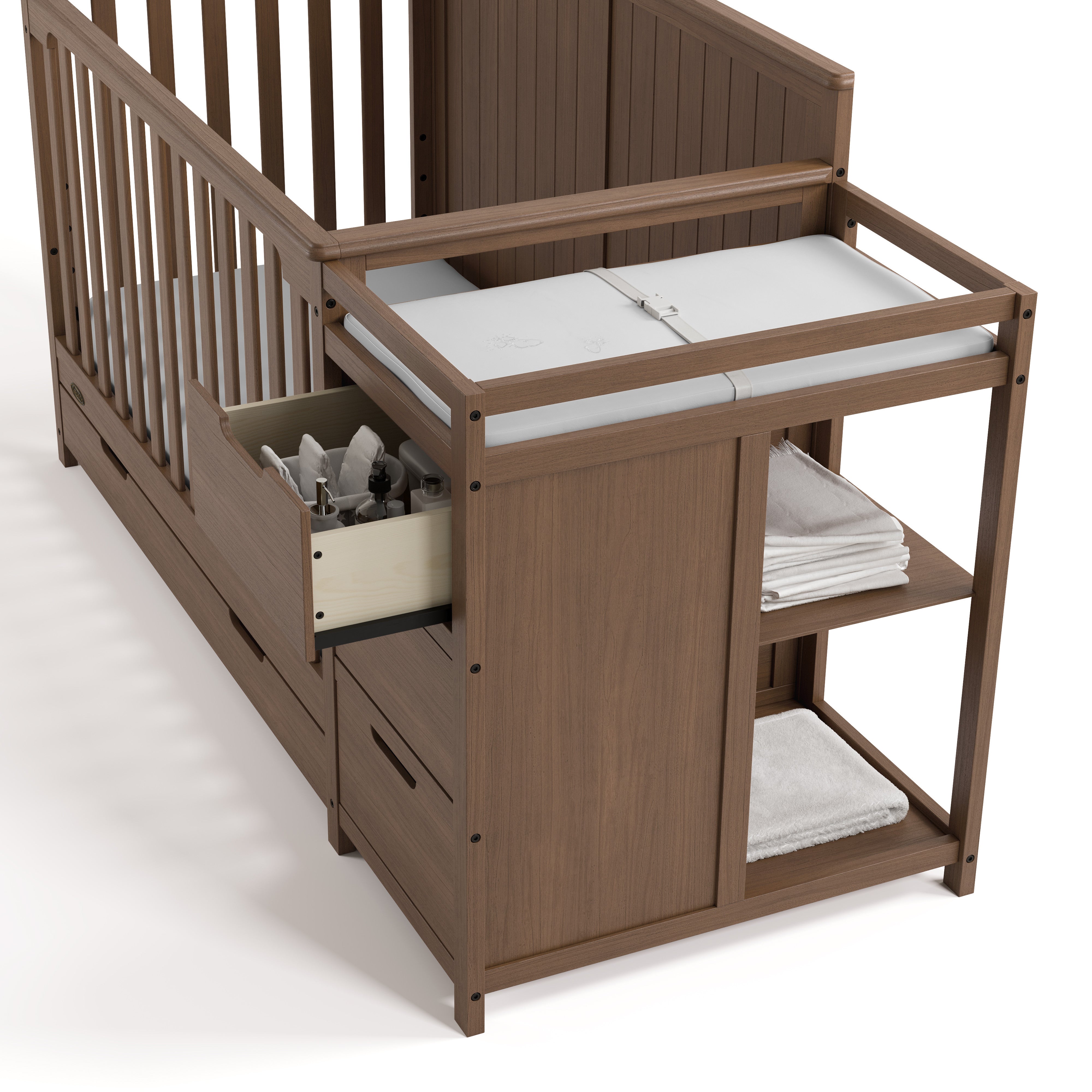 Hadley hazelnut crib and changer close up of attached changing table