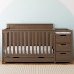 Hadley hazelnut crib and changer in a nursery