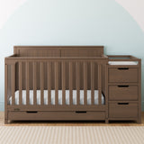 Hadley hazelnut crib and changer in a nursery
