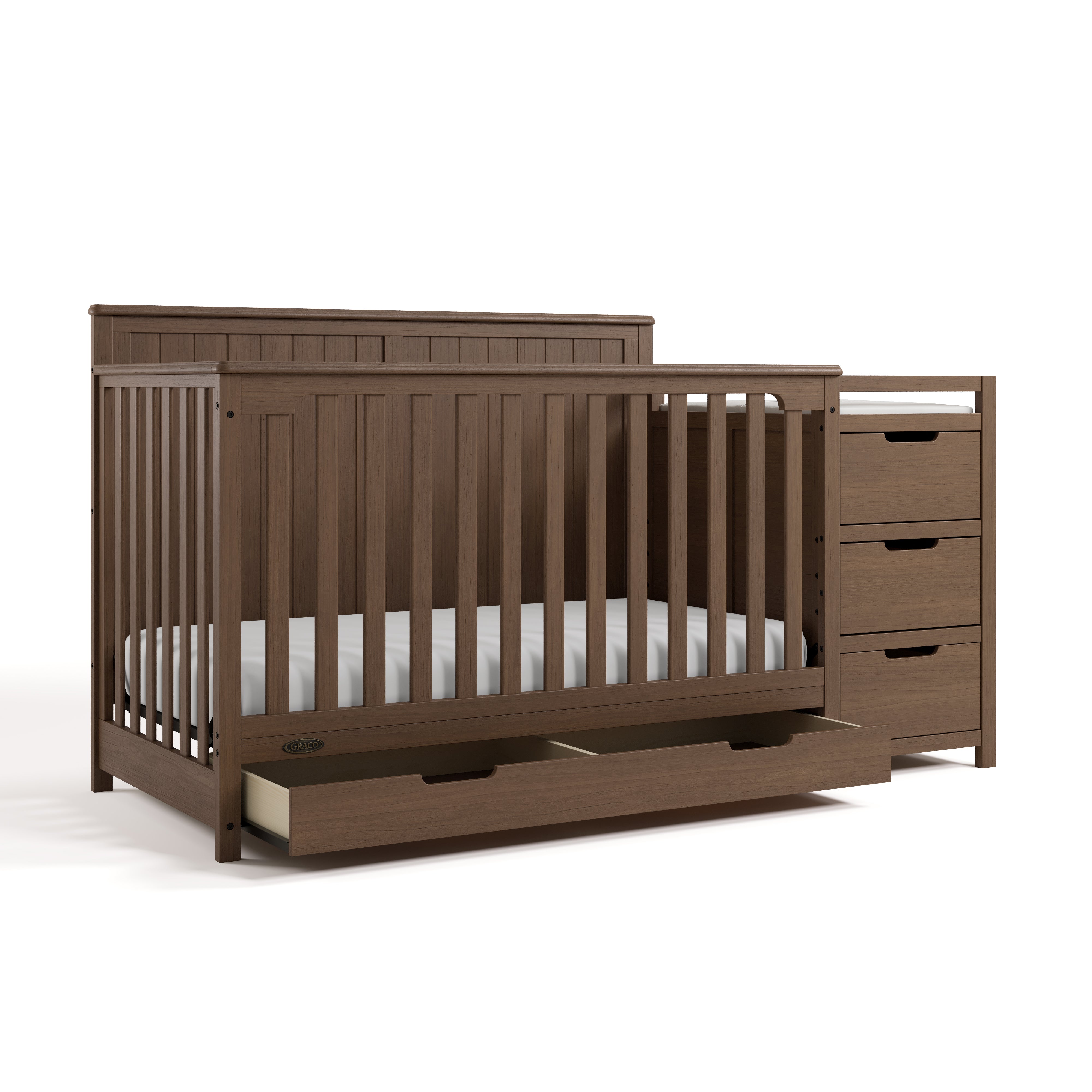 Hadley hazelnut crib and changer with drawer open angle view