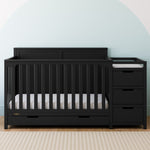 graco hadley black crib and changer in nursery