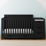 graco hadley black crib and changer in nursery