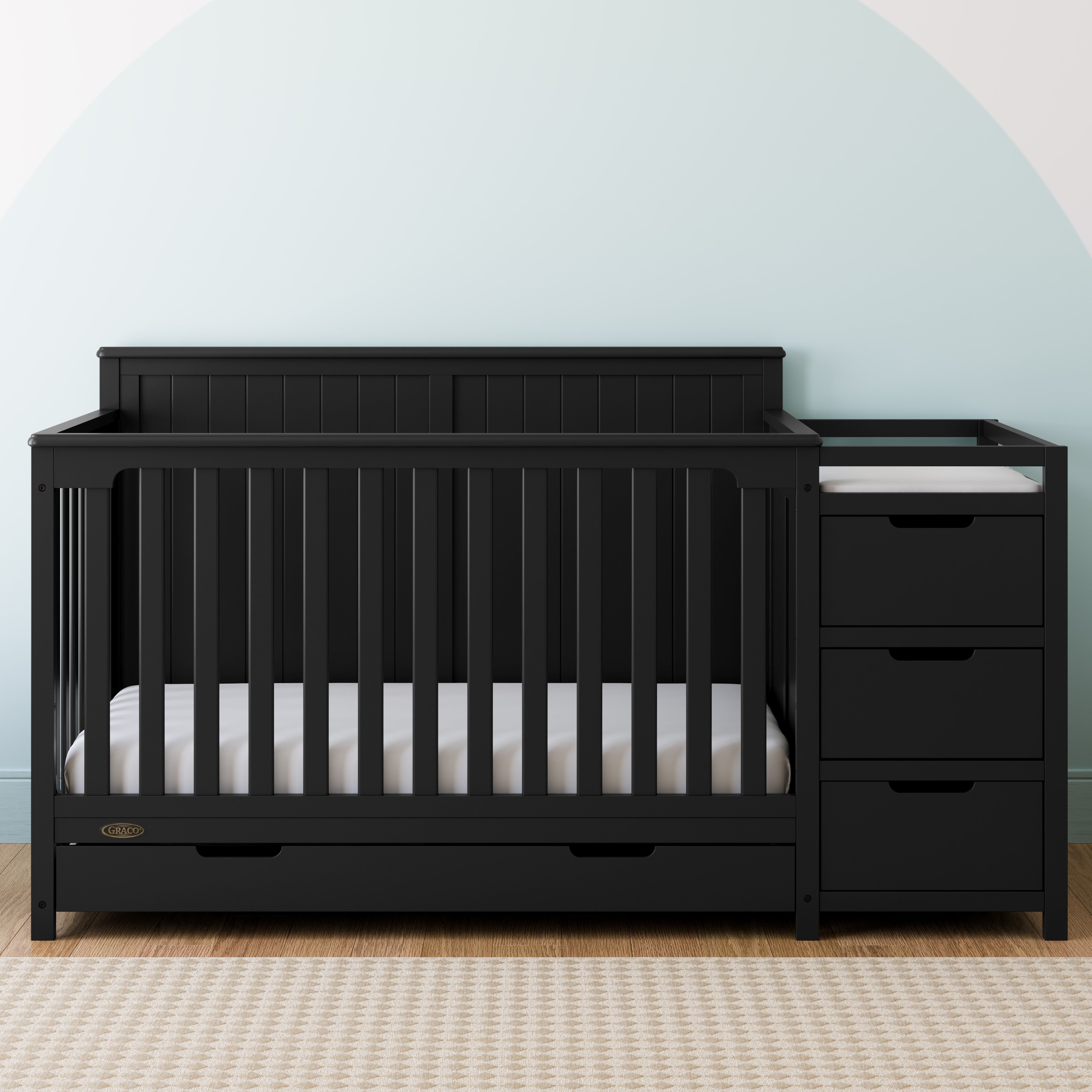 graco hadley black crib and changer in nursery