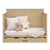 graco tristan driftwood crib with drawer daybed conversion with pillows and teddy bears