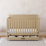 Graco® Tristan™ Convertible Crib With Drawer.