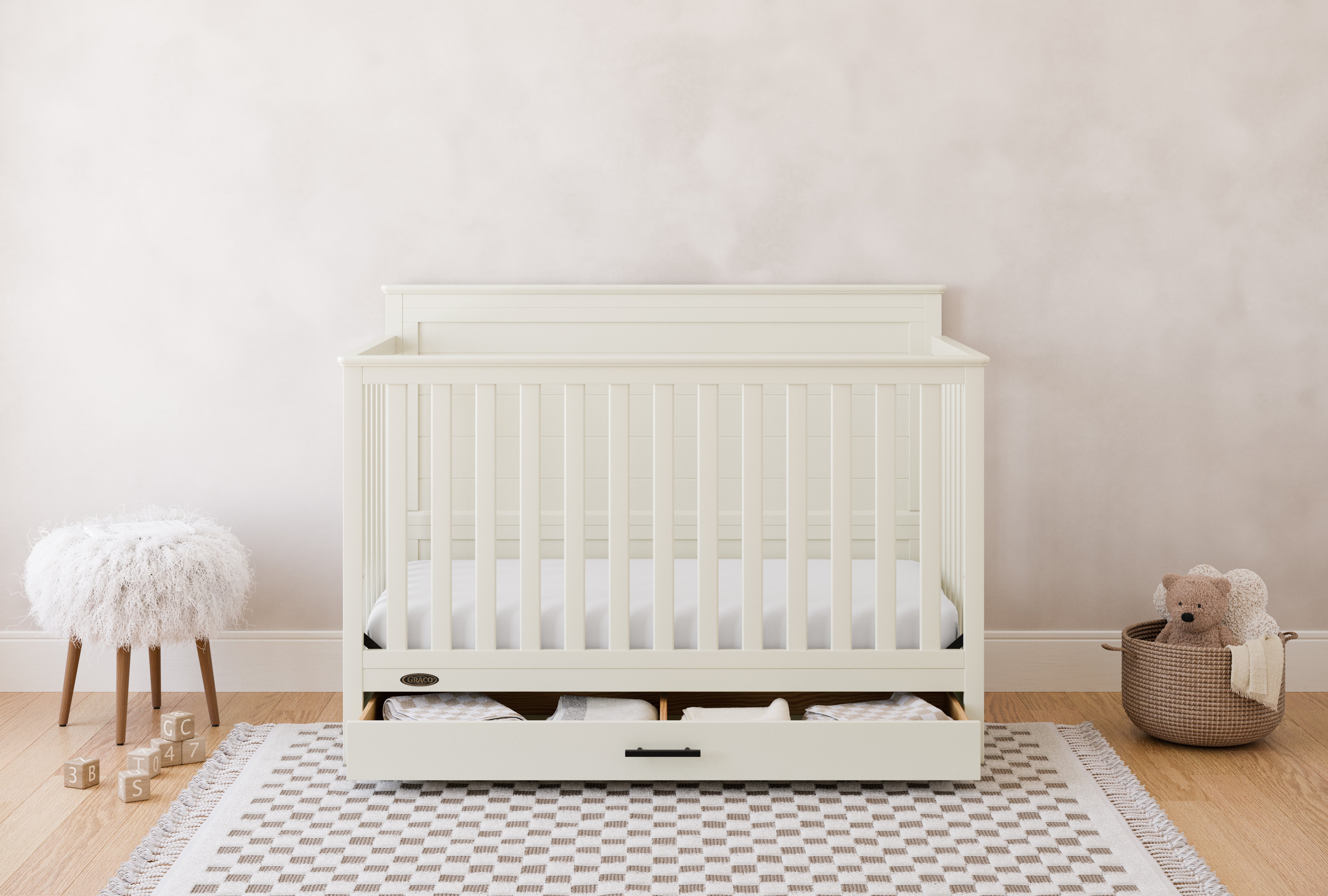 graco tristan frosted oat crib with drawer in nursery
