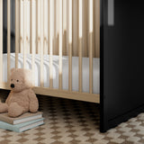 storkcraft calabasas black with driftwood close up of base in nursery