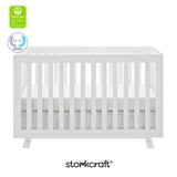 Beckett white crib with GGG and PTPA logo on top left