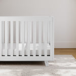 storkcraft beckett white crib in nursery