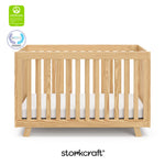Beckett natural crib with GGG and PTPA logo on top left