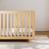 storkcraft beckett natural crib in nursery