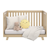 Front view of Driftwood Crib in daybed conversion