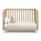 Front view of Driftwood Crib in toddler bed conversion