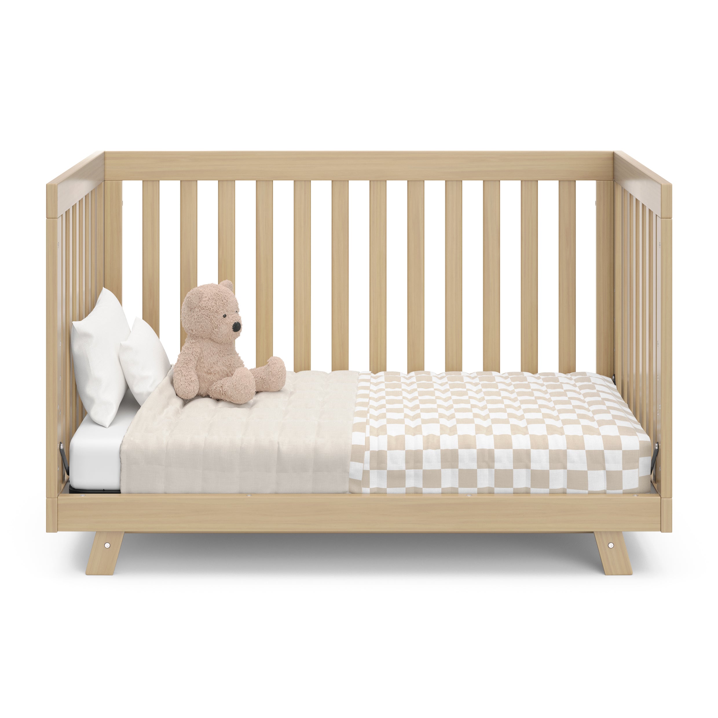 Front view of Driftwood Crib in toddler bed conversion