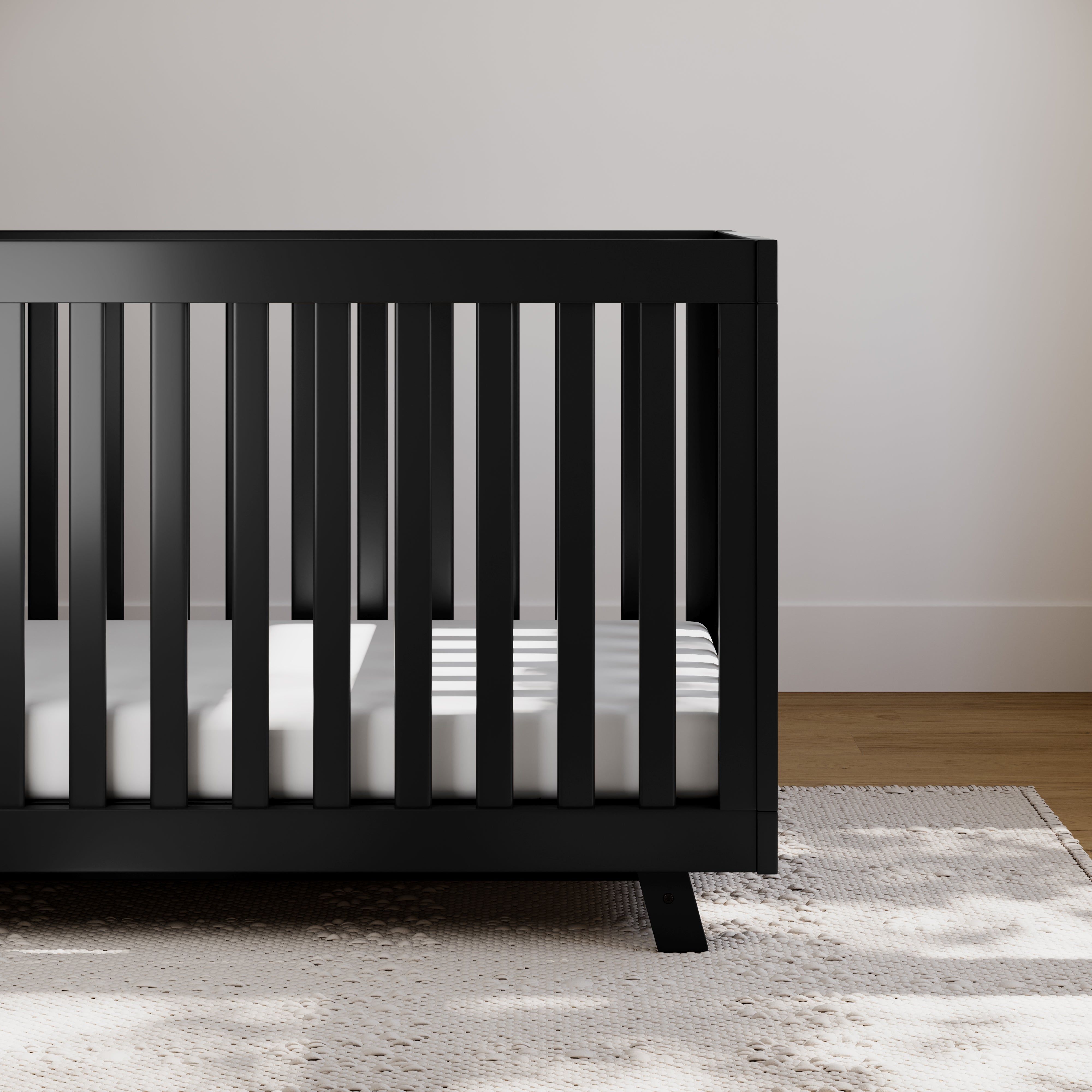 storkcraft beckett black crib in nursery