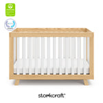 Beckett crib natural with white with GGG and PTPA logo on top left
