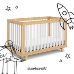 Beckett crib natural with white with black doodles overlaid on image