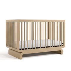 Natural wood baby crib with curved base
