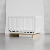 santorini crib white with driftwood in studio