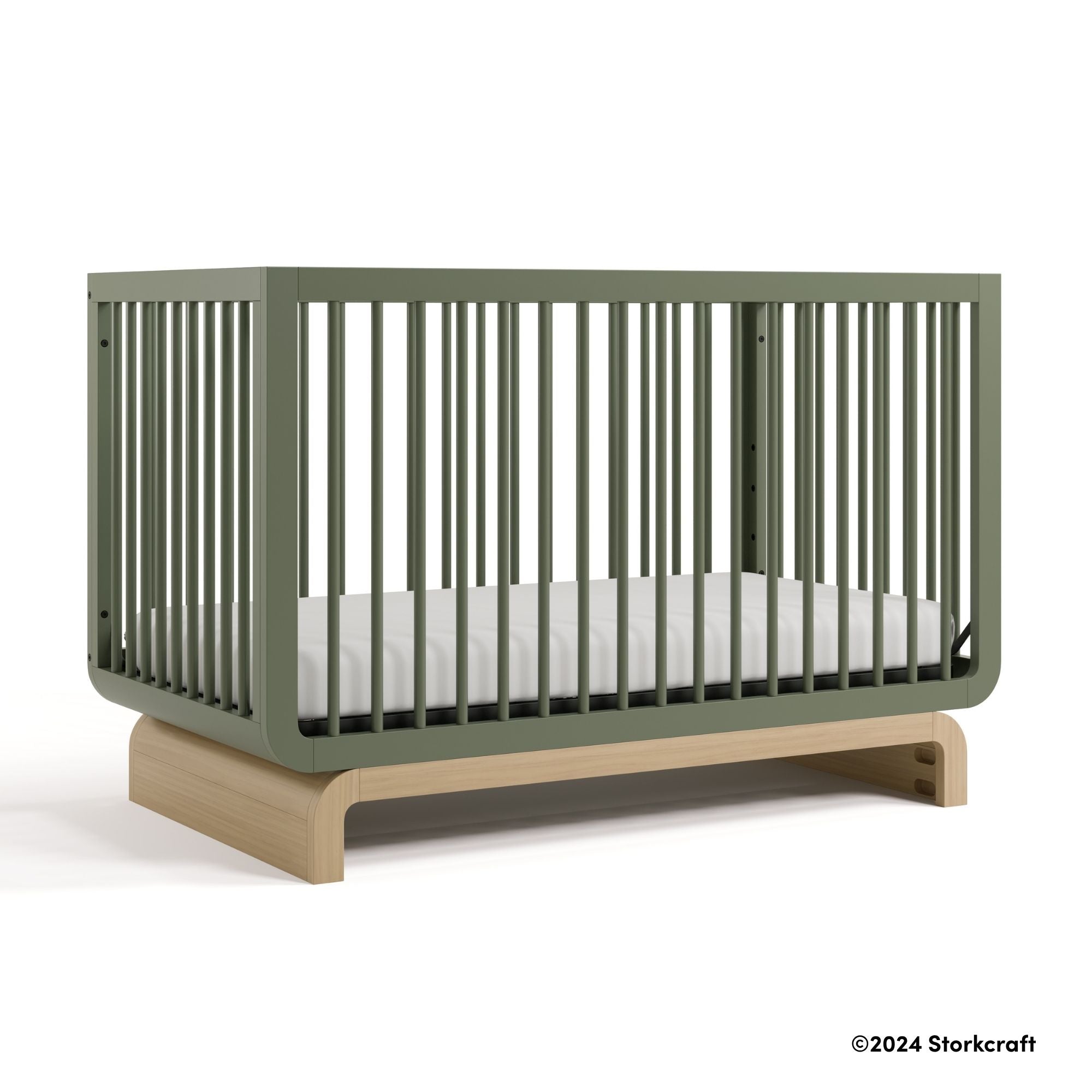 Santorini olive with driftwood crib with 2024 Storkcraft copyright on bottom right