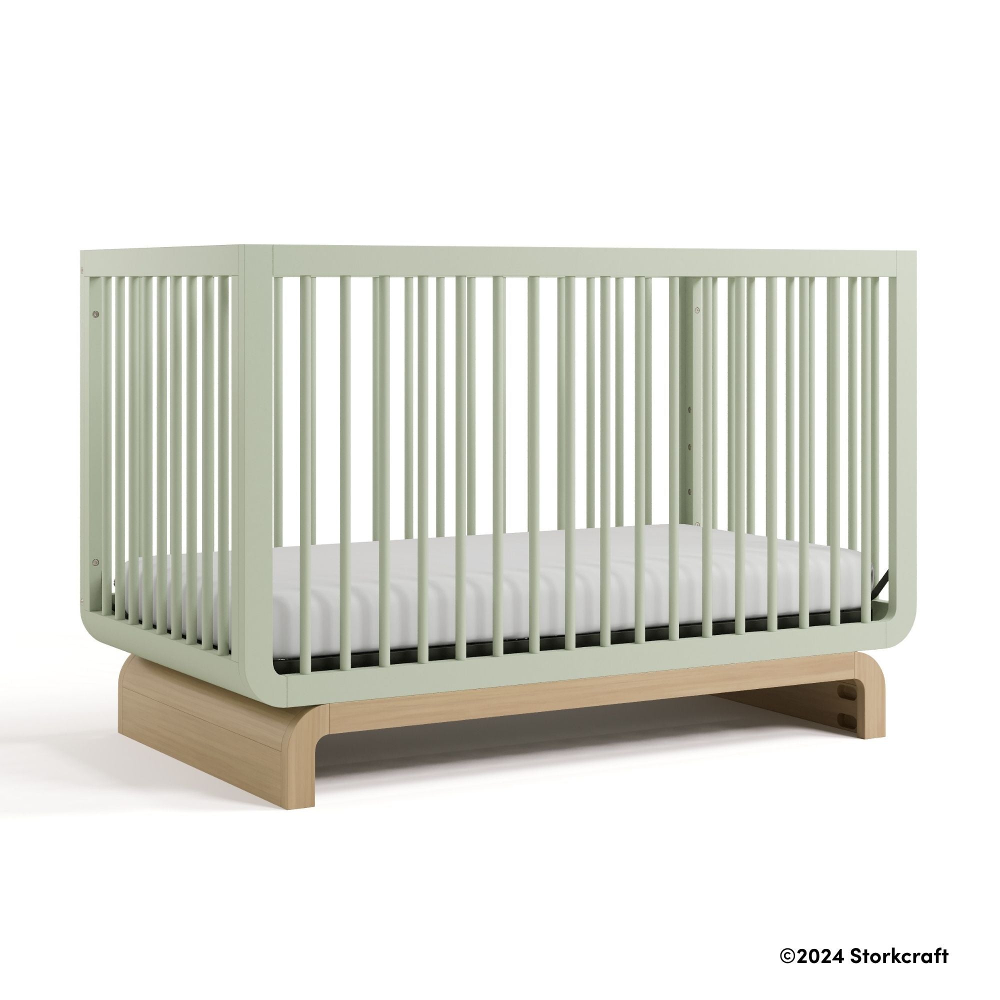 Santorini sage with driftwood crib with 2024 Storkcraft copyright on bottom right