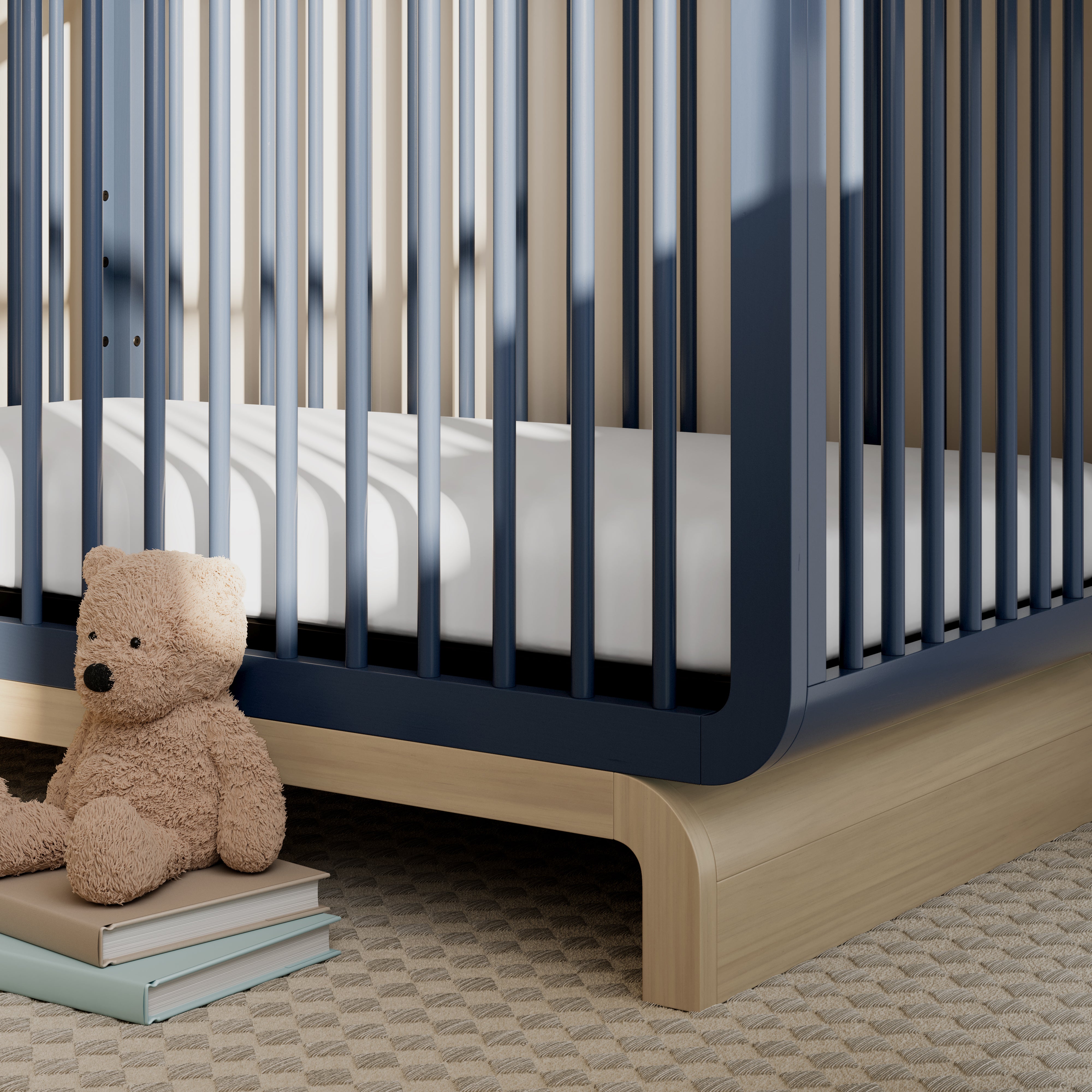 Santorini midnight blue with driftwood crib in a nursery