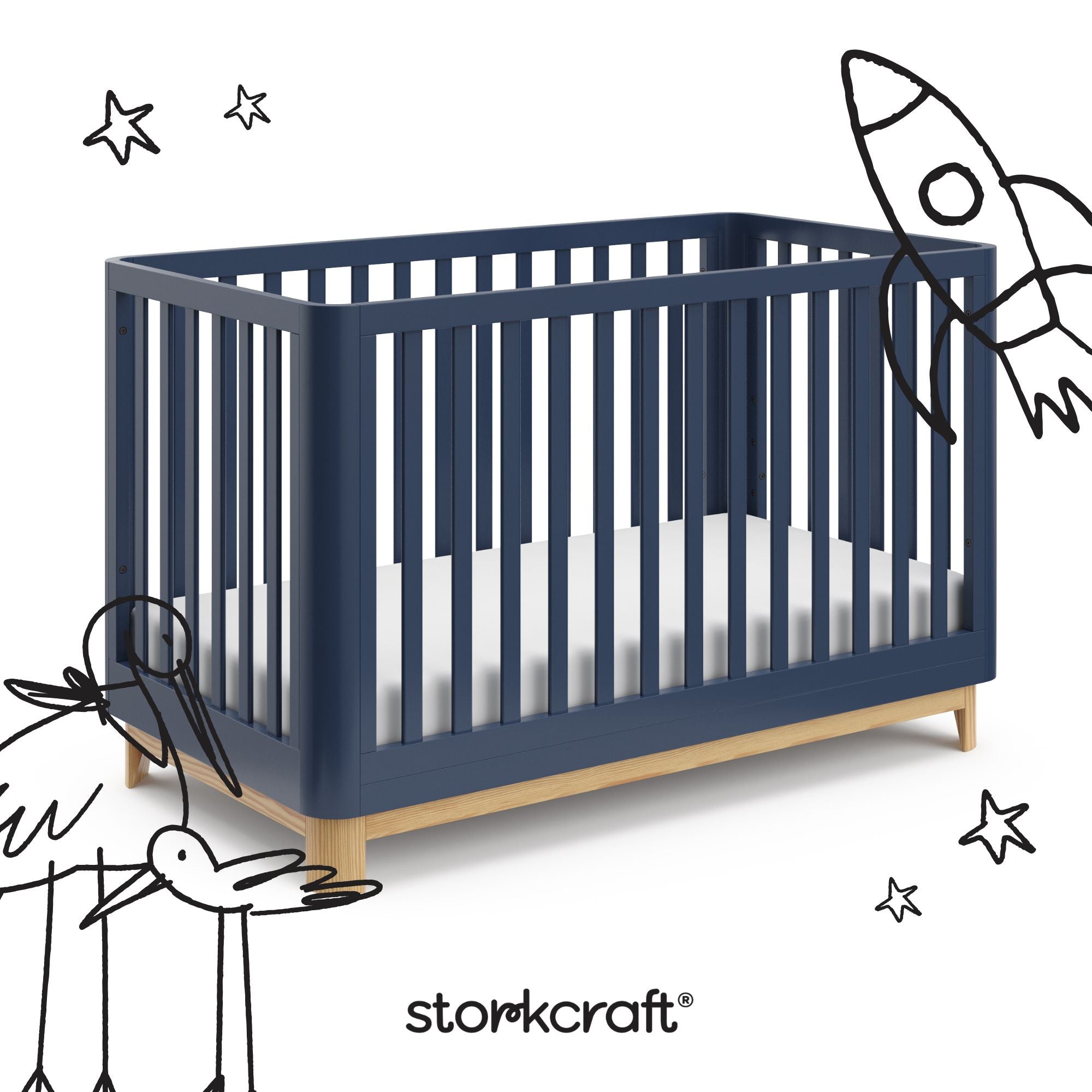 santos midnight blue with natural crib with black cartoon drawings