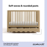 Casablanca driftwood crib front view showing soft waves and rounded posts callout image