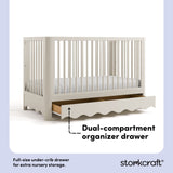 Casablanca frosted oat crib angle view with drawer open showing dual-compartment storage drawer callout image