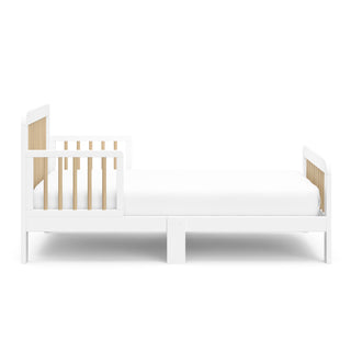 side view of white with driftwood toddler bed