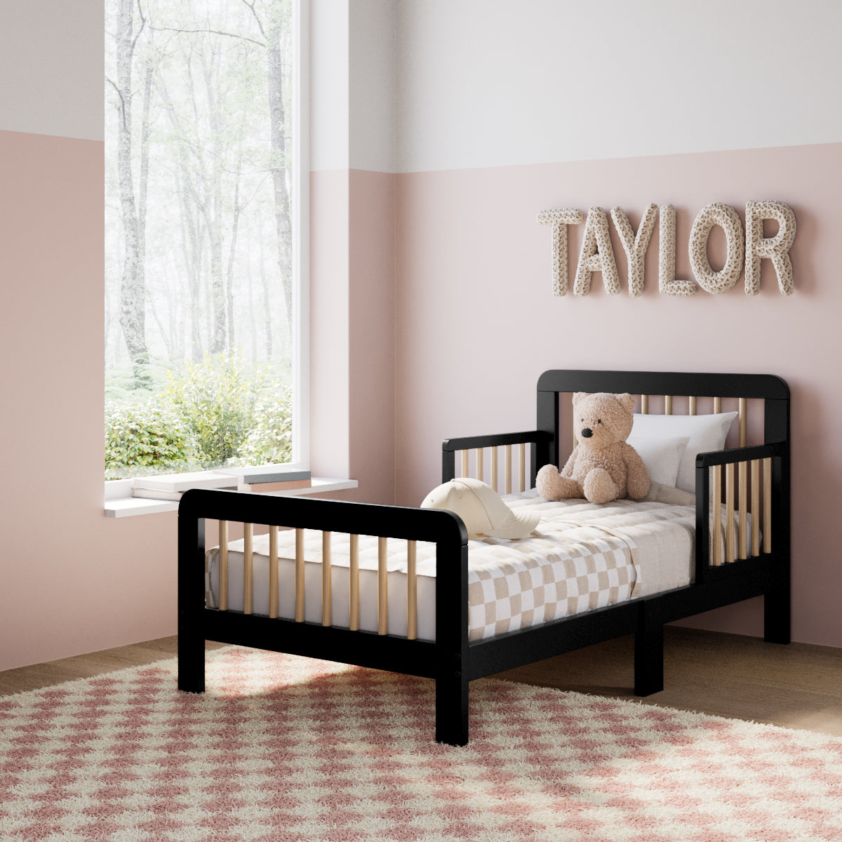 storkcraft pasadena black with driftwood toddler bed in kids room by window