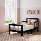 storkcraft pasadena black with driftwood toddler bed in kids room by window