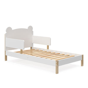 Angled view of white with driftwood toddler bed