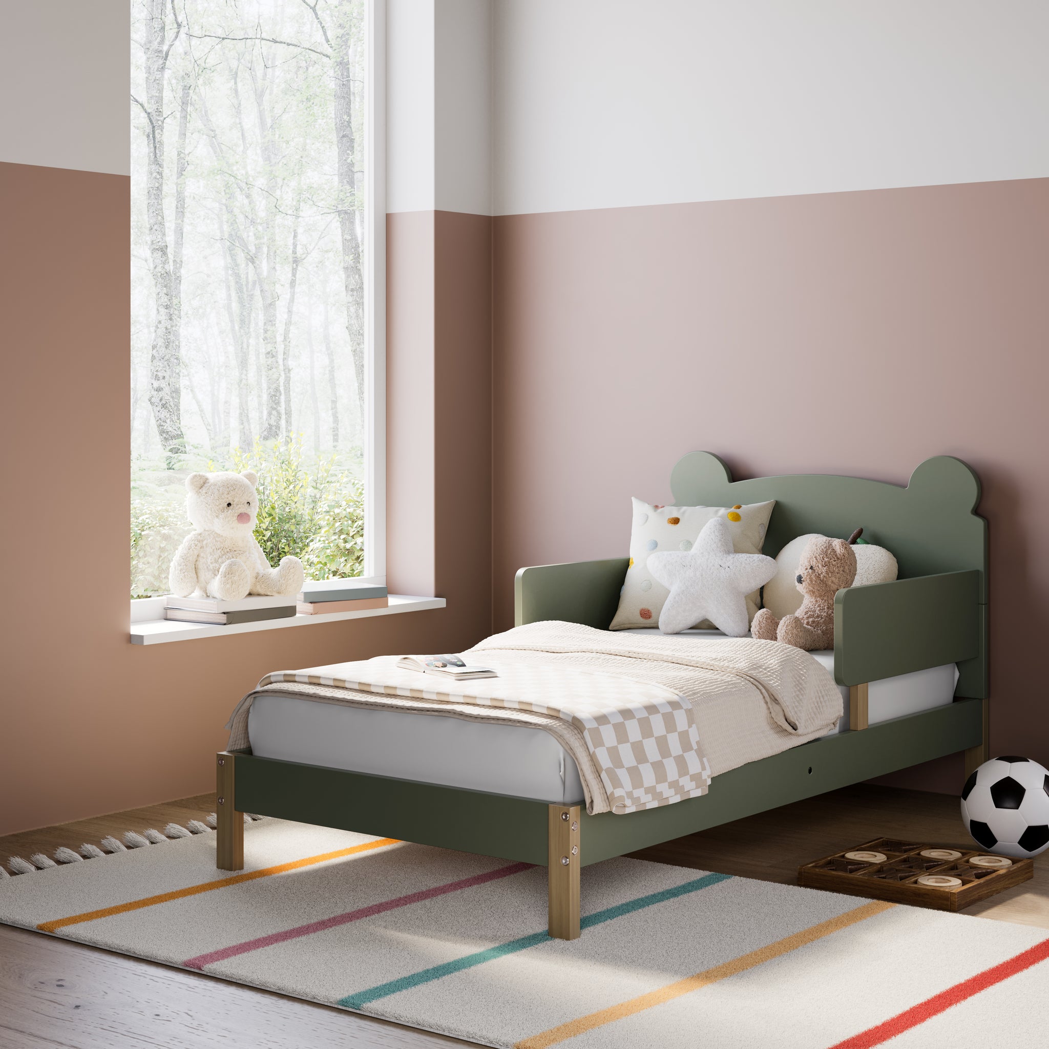 Olive-colored toddler bed in nursery