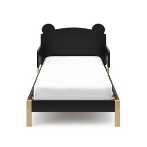 Front view of a black-colored toddler bed with teddy bear ears shape