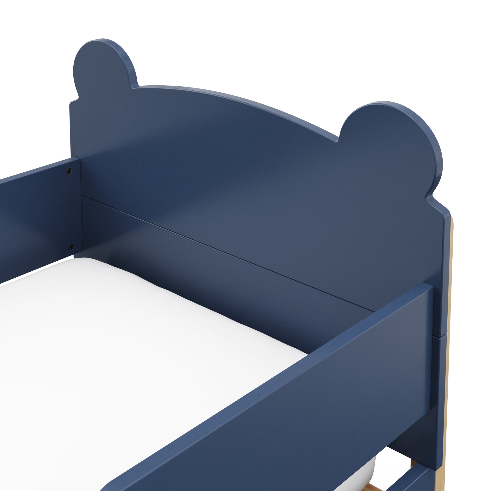 close up view of a blue-colored toddler bed
