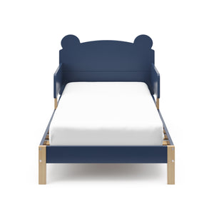 front view of a blue-colored toddler bed